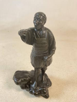 Lot 414 - A Japanese Meiji period bronze figure of a...