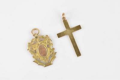 Lot 1458 - A 9ct yellow gold medal fob, approx 5.5g, and...