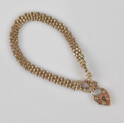 Lot 1169 - A rose metal gate link bracelet with 9ct gold...