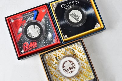 Lot 1112 - ROYAL MINT; three rock related ½ oz...