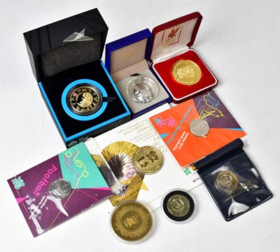 Lot 1114 - Eight Olympic and sport related coins and...