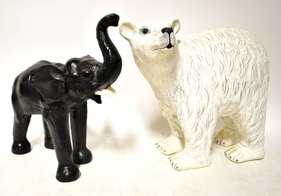 Lot 768 - A papier-mâché polar bear model with painted...