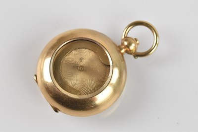 Lot 1468 - A gold filled sovereign holder with glass...