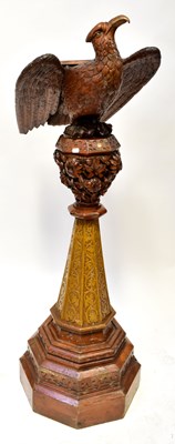Lot 88 - A 19th century carved walnut lectern, the top...