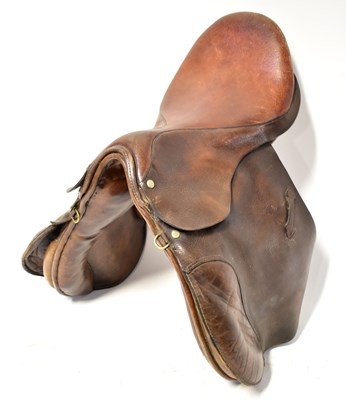 Lot 783 - A vintage leather horse saddle with brass...
