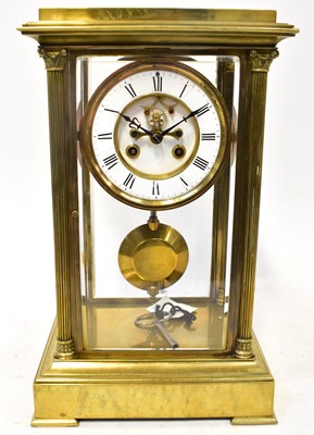 Lot 117 - A 19th century French brass mantel clock with...