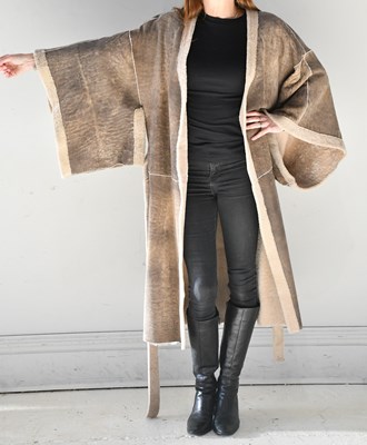 Lot 374 - TANYA BATANOFF; a full length faux cream...