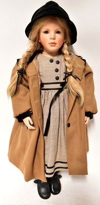 Lot 503 - A boxed modern German bisque headed doll, by...