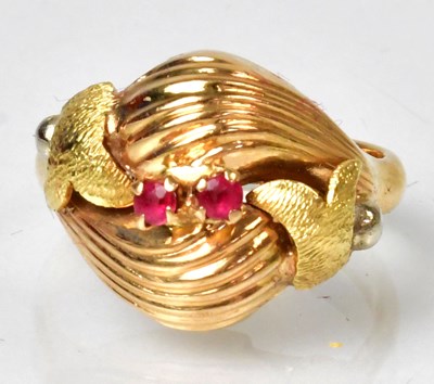 Lot 1144 - An 18ct gold cocktail ring in the form of...