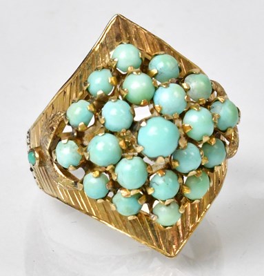 Lot 1156 - A 1970s 14ct gold cocktail ring with textured...