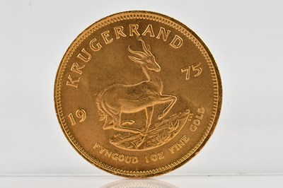 Lot 1001 - A full Krugerrand, 1975, 1oz fine gold.
