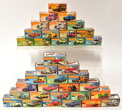 Lot 479 - MATCHBOX; fifty-two '75 boxed diecast vehicles,...