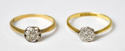 Lot 1154 - Two 18ct yellow gold rings, one set with seven...