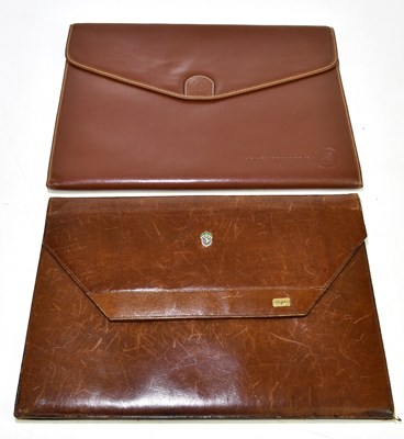 Lot 212 - Two leather document wallets, one bearing the...