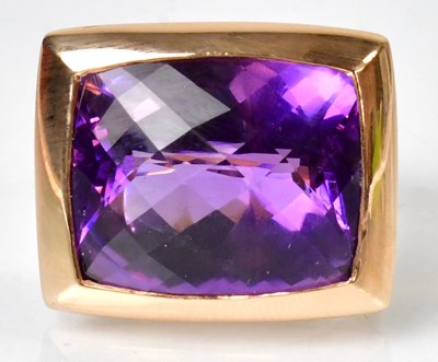 Lot 1142 - An 18ct gold cocktail ring set with a...