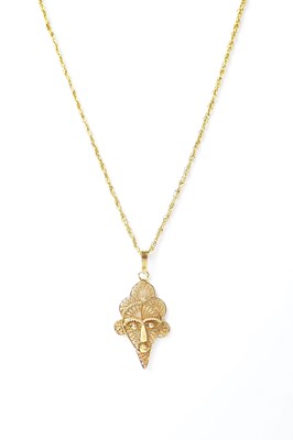 Lot 1270 - A yellow metal filigree pendant in the form of...