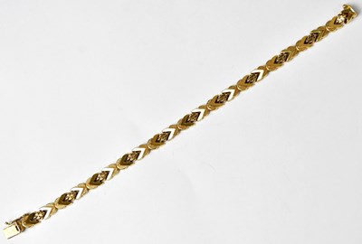 Lot 1232 - An 18ct yellow gold flat chain link bracelet,...