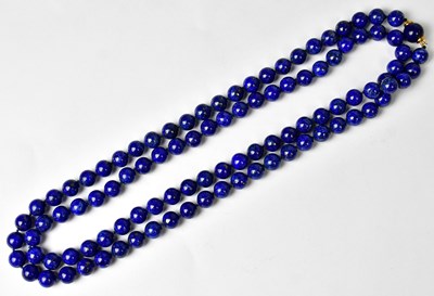 Lot 1285 - KATROS; a lapis lazuli beaded necklace, with...