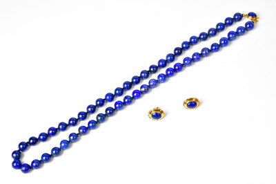 Lot 1346 - A lapis lazuli necklace with 18ct gold clasp,...