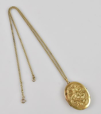 Lot 2143 - A 9ct yellow gold locket of oval form with...