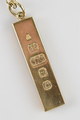 Lot 2032 - A 9ct yellow gold ingot, hallmarked for London...