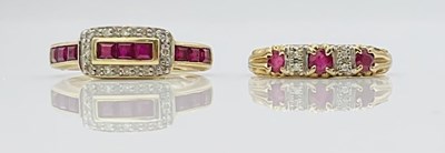 Lot 737 - Two 9ct yellow gold diamond and ruby set dress...