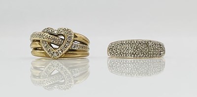 Lot 690 - Two 9ct yellow gold dress rings, both size Q,...