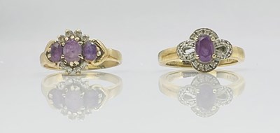 Lot 740 - Two 9ct yellow gold amethyst set dress rings,...