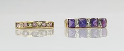 Lot 741 - A 9ct yellow gold amethyst set dress ring,...