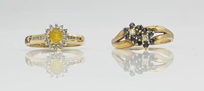 Lot 713 - Two 9ct yellow gold gem set dress rings, sizes...