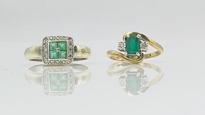 Lot 716 - Two 9ct yellow gold dress rings, the three...