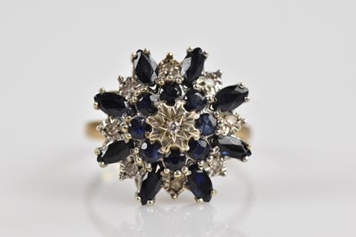 Lot 2491 - A yellow metal diamond and sapphire illusion...