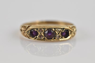 Lot 2567 - A 9ct yellow gold amethyst set seven stone...