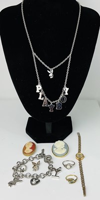 Lot 763 - A 9ct yellow gold three stone dress ring,...