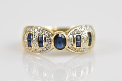 Lot 2321 - A yellow metal sapphire and diamond illusion...