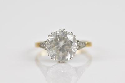 Lot 2489 - A yellow metal solitaire dress ring, stamped...