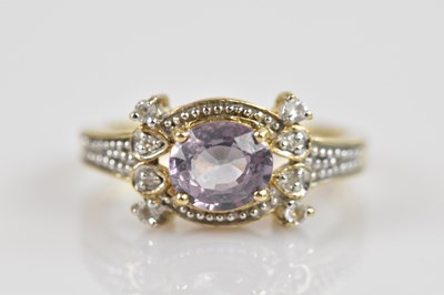 Lot 2316 - A 9ct yellow gold illusion set amethyst dress...