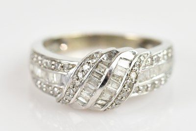 Lot 2314 - A white metal diamond set cluster ring,...
