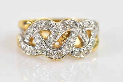 Lot 2315 - A yellow metal diamond set dress ring, set...