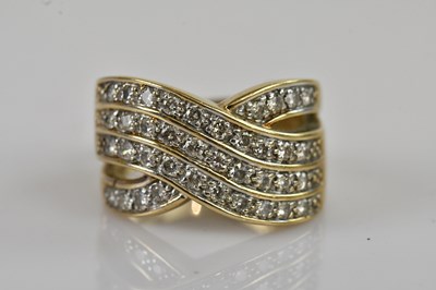 Lot 2366 - A yellow metal diamond set dress ring, set...