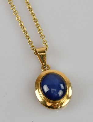 Lot 2041 - A yellow metal framed pendant, stamped '750',...