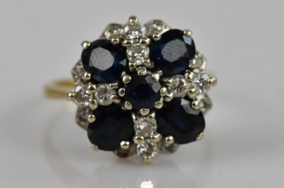 Lot 2313 - A yellow metal diamond and sapphire set...