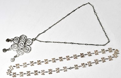Lot 1279 - A white metal chain link necklace, each...