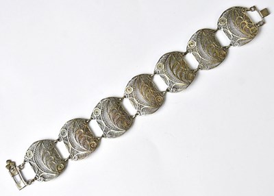Lot 1214 - An Indian white metal filigree chain link...
