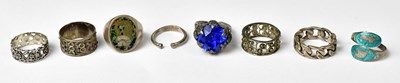 Lot 1191 - Eight white metal rings, to include filigree...