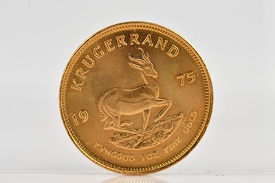 Lot 1002 - A full Krugerrand, 1975, 1oz fine gold.