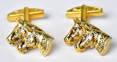 Lot 1316 - A pair of gold-plated cufflinks, each in the...