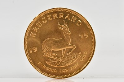Lot 1003 - A full Krugerrand, 1975, 1oz fine gold.