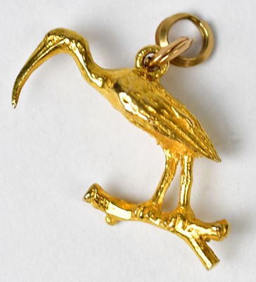 Lot 1247 - A 10ct yellow gold charm in the form of an...