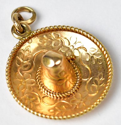 Lot 1245 - A 14ct yellow gold charm in the form of a...